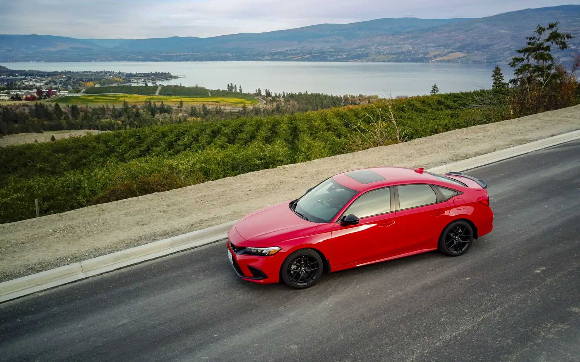 2023 Honda Civic SI parked on a hill above Okanagan Lake